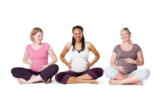 Pregnant women or friends ready for yoga, pilates or birth class for help, support and community or wellness. Happy mother with smile and hope of life growth sitting on floor with white background.