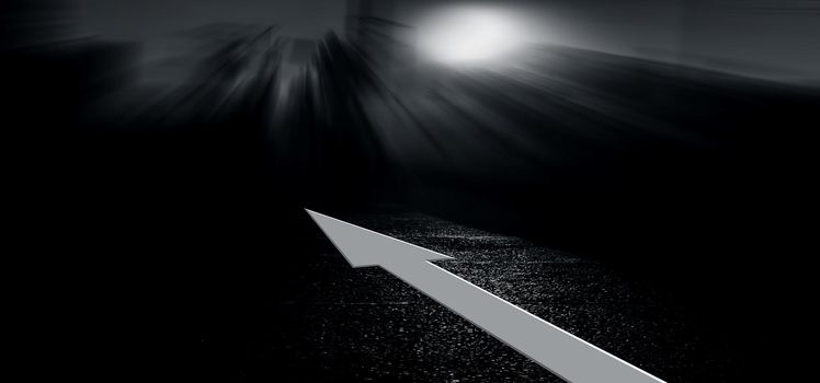Creative shot of a white-colored arrow on roads leading somewhere in the infinity during sunset/sunrise time with dramatic colors.