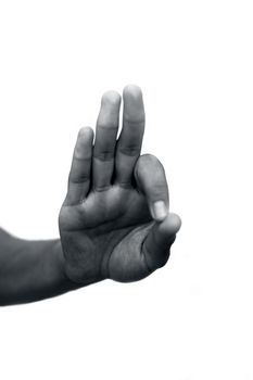Shot of single human hand doing Ahamkara Mudra isolated on white.Vertical shot of hand demonstrating Ahamkara Mudra.