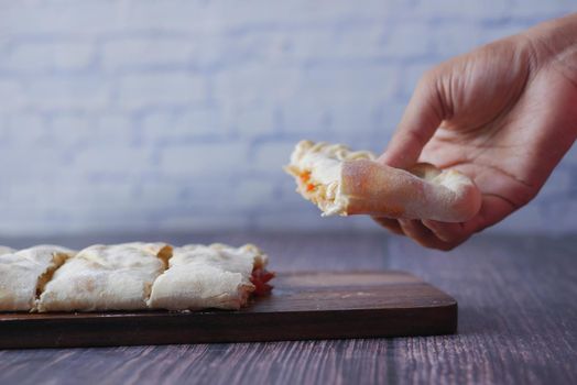 pizza calzone on a table .