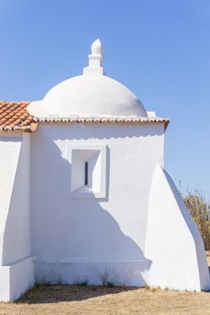 White ancient chapel building Saint Bartolomeu. Sines, Portugal