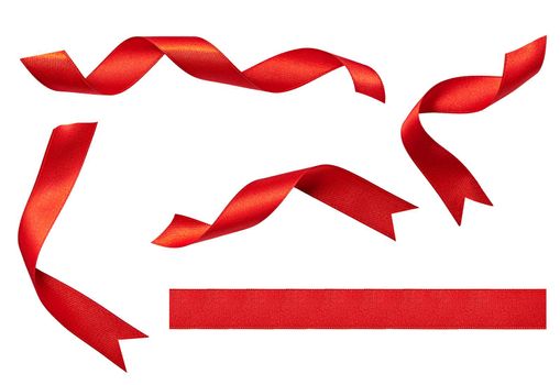 close up of a red ribbon bow on white background