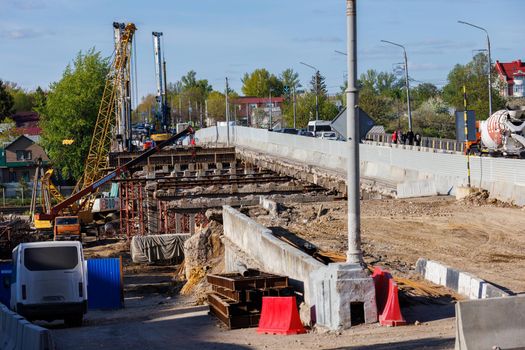 Bridge reconstruction process at summer day in Tula, Russia - April 23, 2022. Telephoto view with narrow angle.