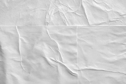 Blank white crumpled and creased paper poster texture background