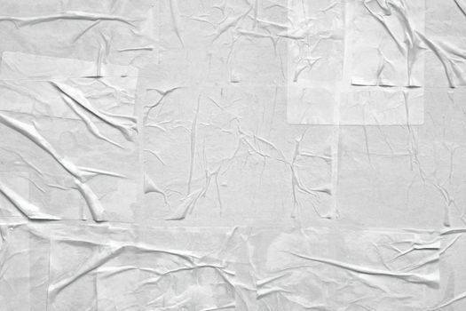 Blank white crumpled and creased paper poster texture background