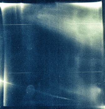 Medium format film frame with heavy scratches, dust and grain