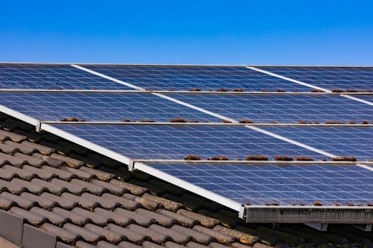 Energy-efficient solar modules of a house roof system for private power generation with photovoltaics in Germany