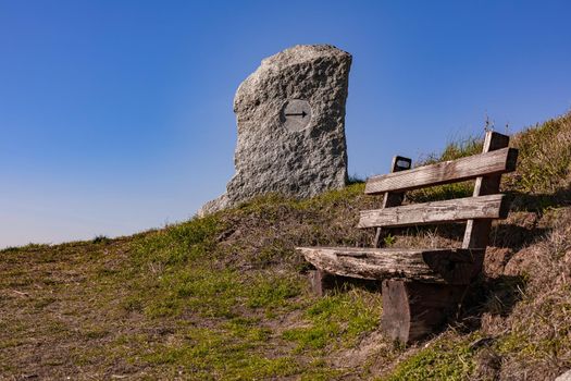 Take a break on a wooden park bench with a great view