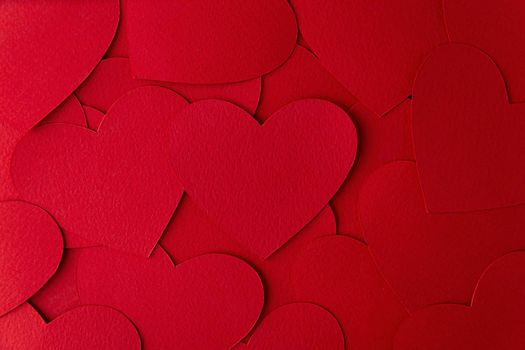 Paper cut red hearts shape background with copy space. Concept image. Valentine's day, mother's day, birthday greeting cards, invitation, celebration