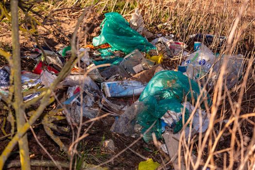 Illegal garbage disposal at the edge of the field in Germany