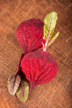 Red beet or beetroot on the wooden table.