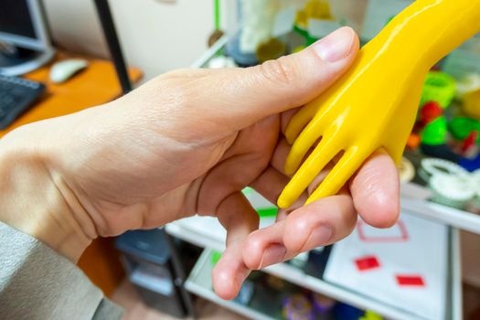 the joy and friendliness of new technologies. 3D printed hand shakes a living hand