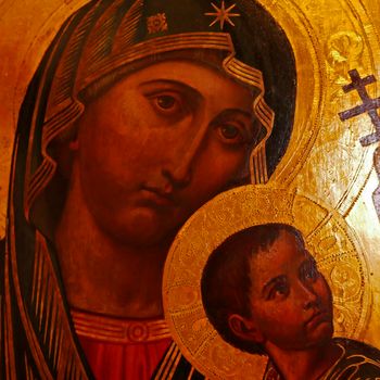 Rheine, NRW, Germany - August 24 2022 Art in the St. Dionysius church. Icon of mother Mary and child Jesus with gold colored background. Detail of the Mother of Perpetual Help.