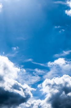 Nature backdrop, solar energy and spiritual concept - Blue sky background, white clouds and bright sunlight