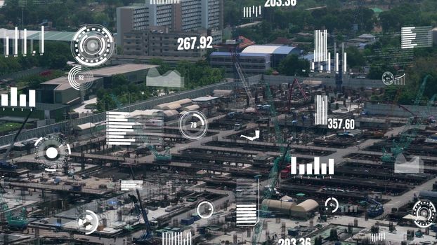 Construction technology concept with alteration graphic over construction site showing concept of automation and remote wireless machine control by using futuristic HUD in a computer software .