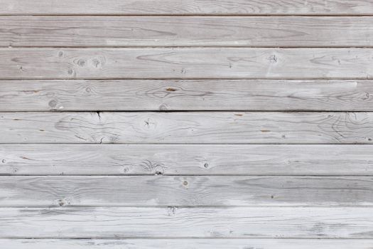 weathered white painted wooden planks board - flat full-frame background and texture with horizontal structure