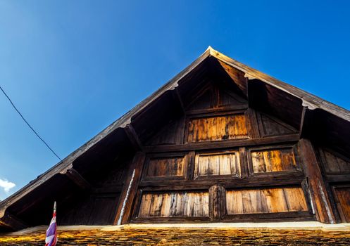 Ancient old wooden building in the clear blue sky day