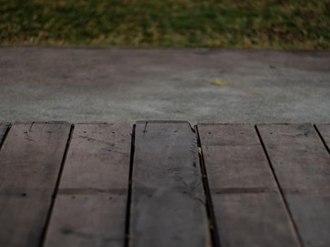 The shabby wooden terrace flooring