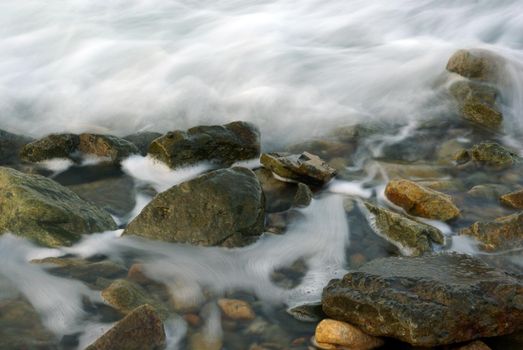 Turbulence sea water and rock at Coastline 