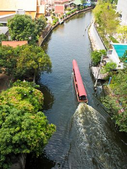 Long-tail passenger boat in Bangkok canal