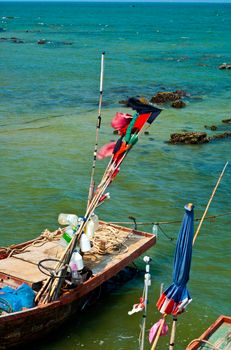 Small Wooden fishing boat coastal drift after returning from fishing