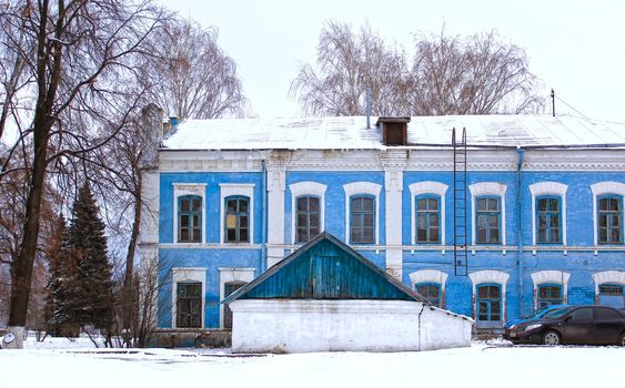 Winter Landscape with Blue House under snow