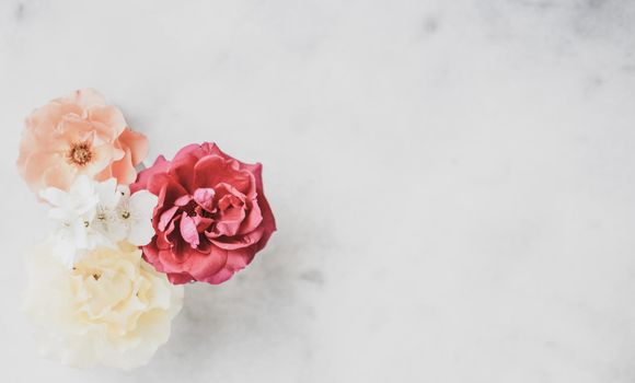 Wedding decor, floral background and beautiful home garden concept - Vintage roses on marble