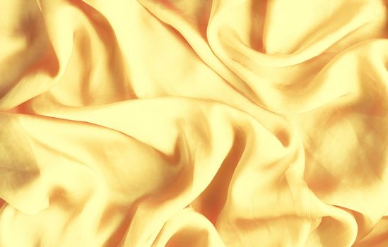 Luxury golden silk background texture - elegant fabric textures, abstract backgrounds and modern pastel colours concept