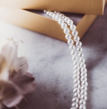 Valentine's day ideas, luxury shopping and holiday inspiration concept - Pearl jewellery in a vintage golden gift box