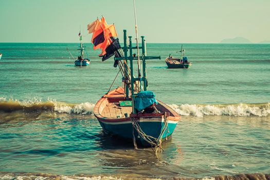 Old Wooden Boats  At The Beach  Andaman Sea, Thailand . Summer seascape with  beautiful beach warm sand .Summer wallpaper background