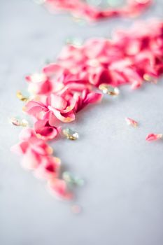 Art of flowers, wedding invitation and nature beauty concept - Rose petals on marble stone, floral background