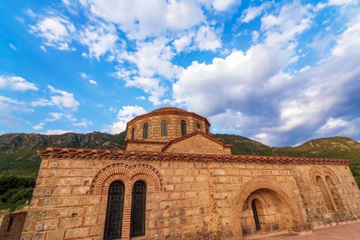 Stone Greek traditional old Orthodox church in Christianoupoli, Messenia. Greece.