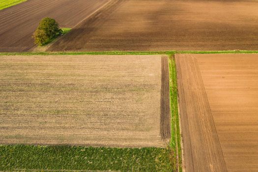 Aerial view of agriculture with various small fields and arable land in Germany