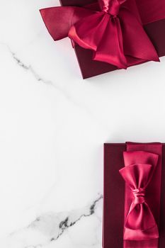 Wedding present, shop sale promotion and love celebration concept - Gift boxes on marble background, holiday flatlay