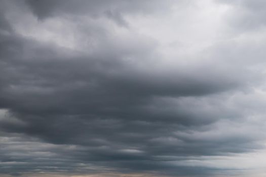 Grey sky background with white clouds