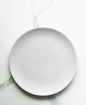 White empty plate on marble, flatlay - stylish tableware, romantic table decor and food menu concept. Serve the perfect dish