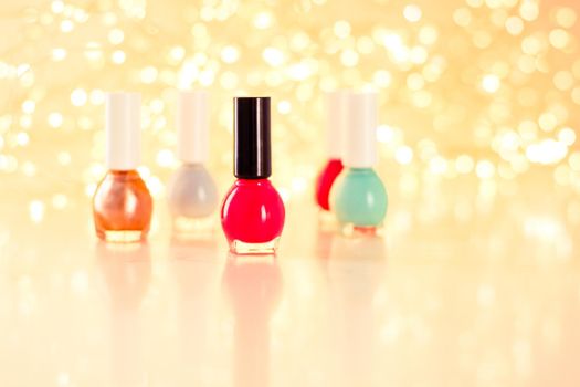 Beauty, make-up and cosmetics concept - Nail polish bottles, manicure and pedicure collection