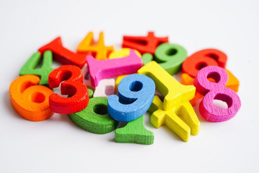 Number wood block cubes for learning Mathematic, education math concept.