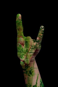 Double exposure shot of pair of hands with some hand sign and having healing nature. Concept of Care for mother nature.