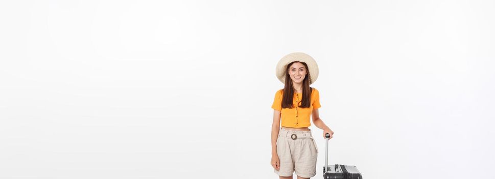 Woman tourist. Full length happy young woman standing with suitcase with exciting gesturing, isolated on white background