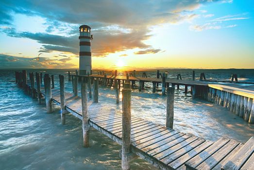 Lighthouse in Lake Neusiedl at sunset. The well known lake with excelent conditions for kiteboarders