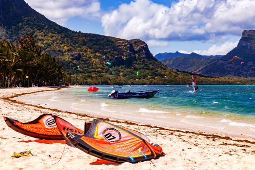 The strong breeze at the south end of the beach of Le Morne in Mauritius attracts many water sports enthusiasts