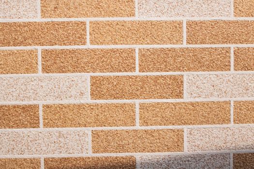 Red brick wall in modern style close up, background or texture