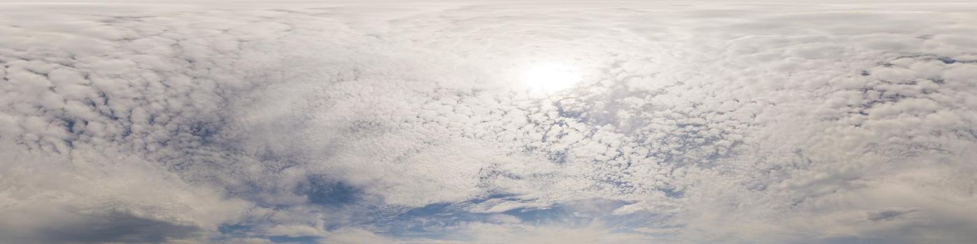 Blue sky with Cumulus clouds Seamless panorama in spherical equirectangular format. Complete zenith for use in 3D graphics, game and for composites in aerial drone 360 degree panoramas as a sky dome.