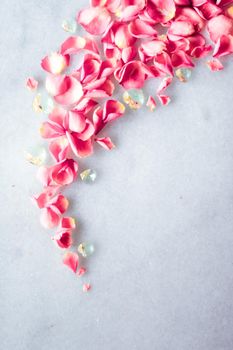 Art of flowers, wedding invitation and nature beauty concept - Rose petals on marble stone, floral background