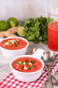 Watermelon tomato gazpacho in bowls. Traditional Spanish cold soup.