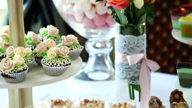 close-up, a variety of delicious desserts, cakes with cream, chocolate and strawberries. whipped cream with cinnamon. festive decor, a sweet bar, a corner, a treat. High quality photo