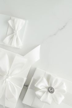 Romantic celebration, lifestyle and holiday present concept - Luxury wedding gifts on marble