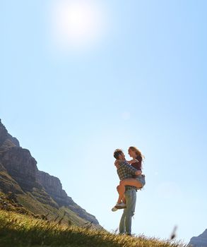 Youre my everything. an affectionate young couple enjoying a day outdoors