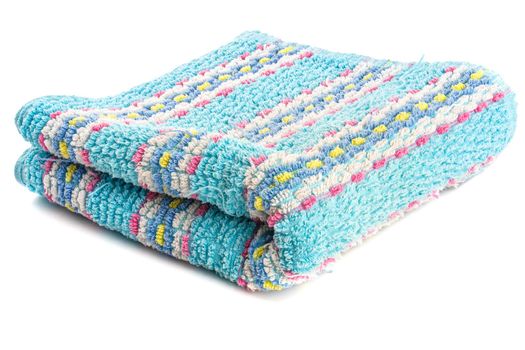 folded old cleaned turquoise towel with stripes ornament isolated on white background.